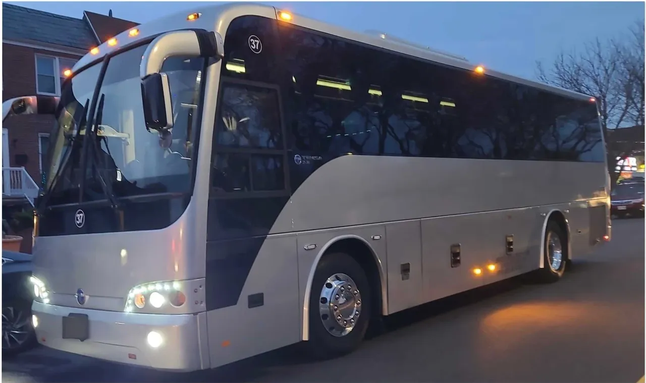 55 Passenger Motor Coach, black – for rent