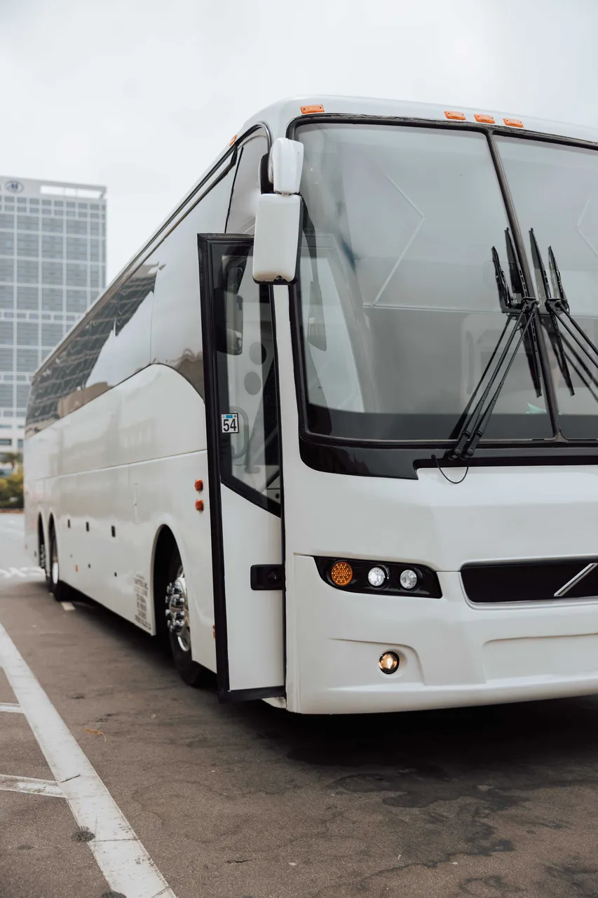 White 56 Passenger Motor Coach exterior, photo 3 for charter bus rental