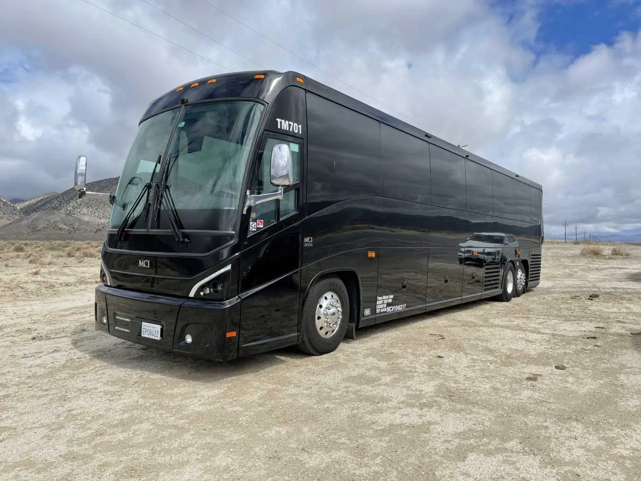 56 Passenger Motorcoach Black 56 Passenger Motorcoach with tinted windows for charter bus rental