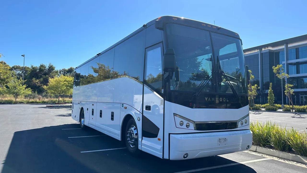 36 Passenger Motorcoach White 36 Passenger Motorcoach for charter bus rental