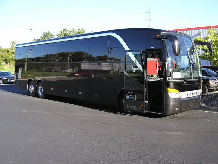 30 Passenger Motorcoach Black 30 Passenger Motorcoach for charter bus rental
