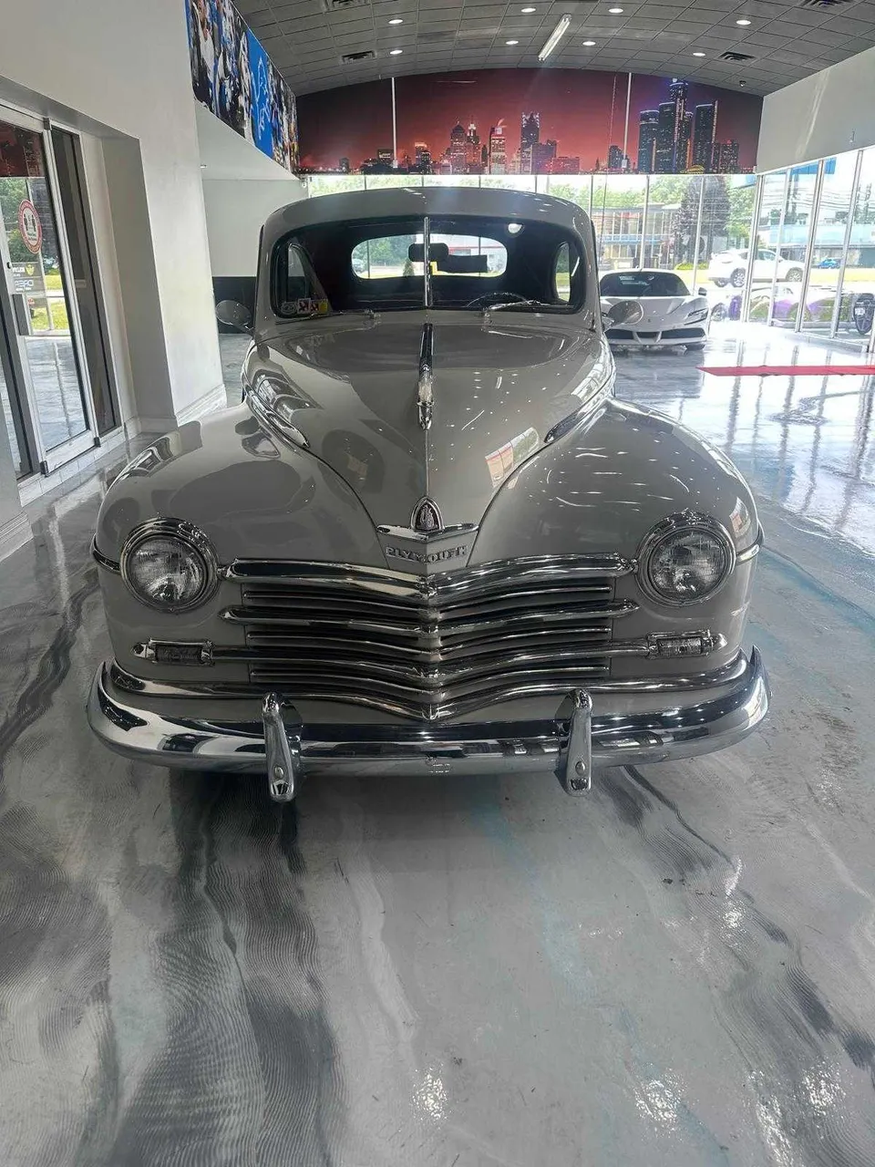 Silver Plymouth Classic for wedding car rental Silver Plymouth Classic for wedding car rental