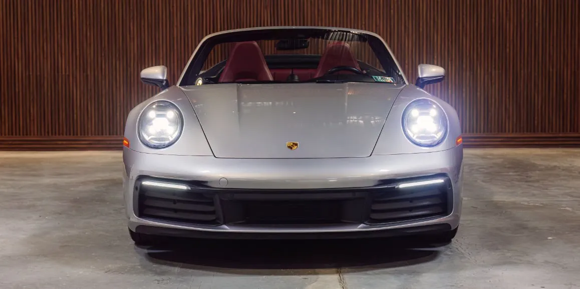 Silver Porsche 911 exterior with convertible roof, photo 3 for sports car rental
