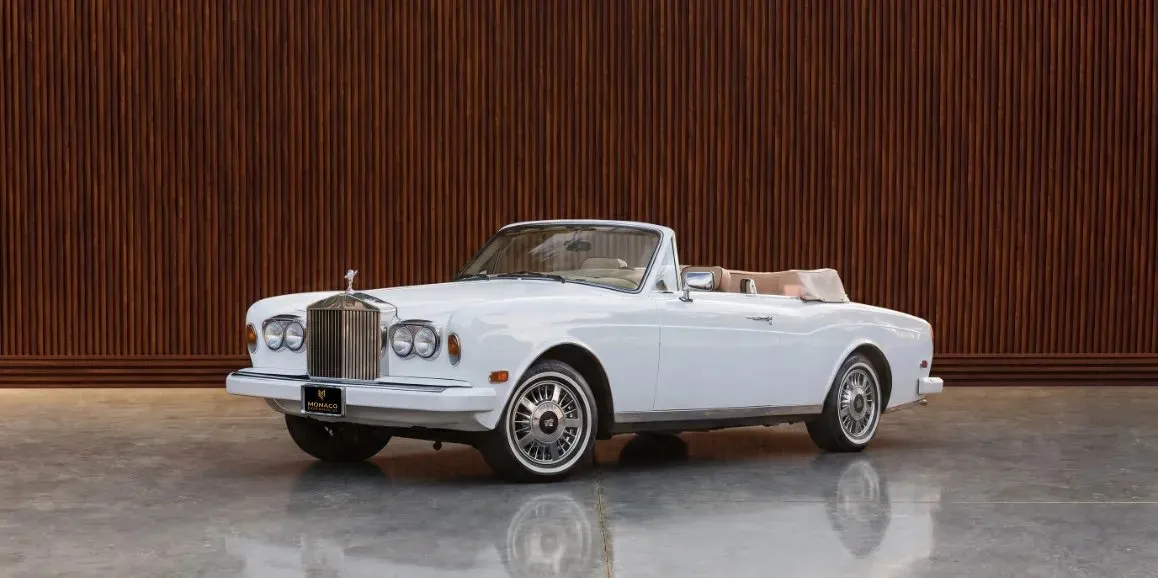 White Rolls Royce Corniche 1975 with convertible roof for wedding car rental