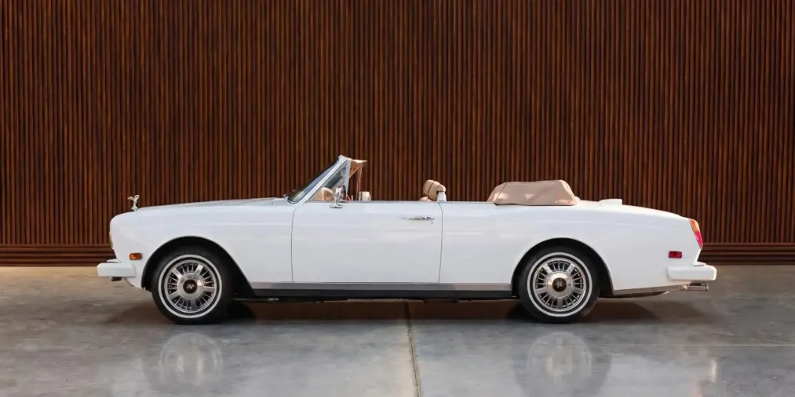 White Rolls Royce Corniche 1975 exterior with convertible roof for wedding car rental