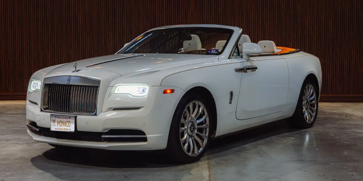 White Rolls Royce Dawn (Hermes) with convertible roof for wedding car rental