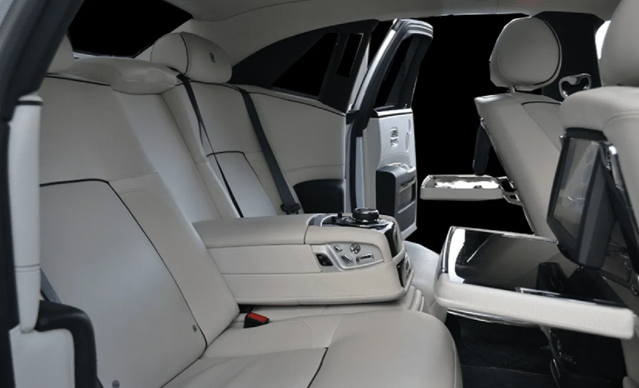 Rolls Royce Ghost interior with rear-seat entertainment screens for wedding car rental