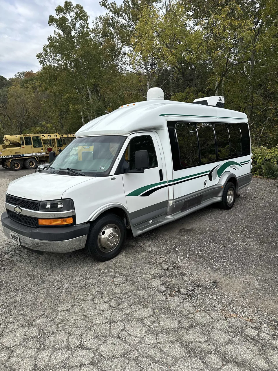 White Small Party Bus exterior with tinted windows for party bus rental