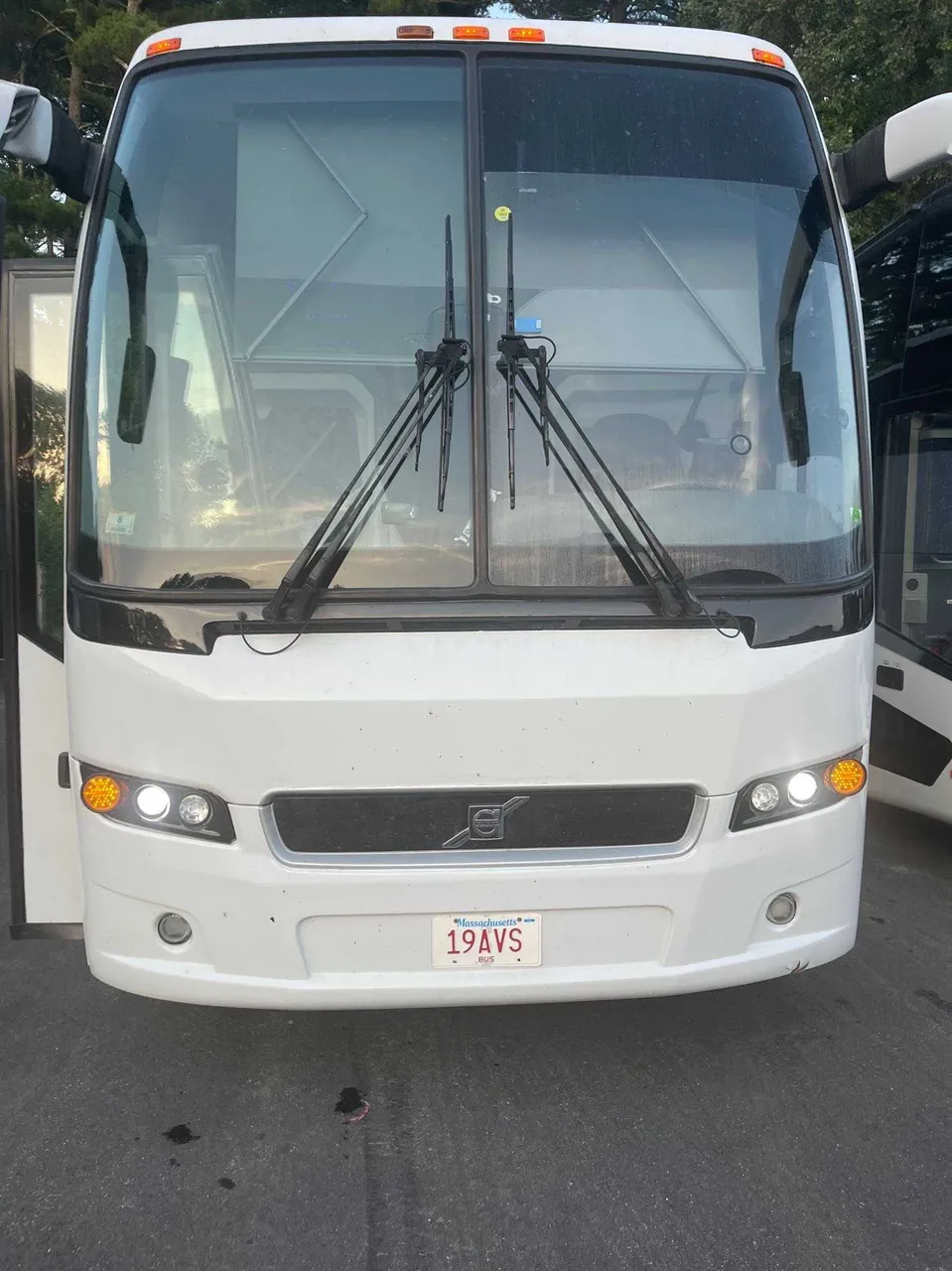 White Volvo Motor Coach exterior for charter bus rental