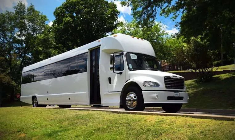 White Freightliner M2 106 Party Bus — 50 Passengers for party bus rental