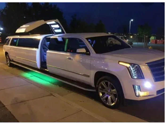 White Stretched Cadillac Escalade in Fort Pierce, FL White Stretched Cadillac Escalade for limo rental